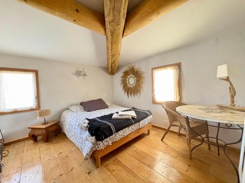 Llit o llits en una habitació de Chez max