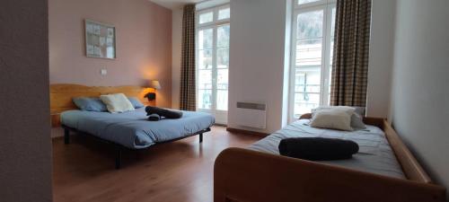 Postel nebo postele na pokoji v ubytování Balaitous