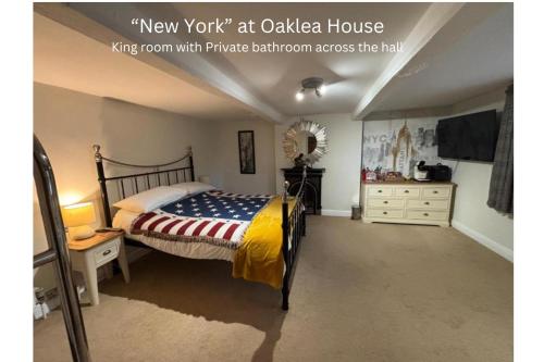 a bedroom with a bed in a attic at Oaklea House in Stoke on Trent