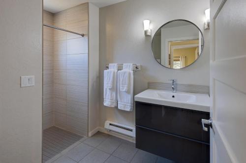 a bathroom with a sink and a mirror at The Kayenta Flat in Moab UT in Moab