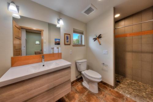 a bathroom with a toilet and a sink at The Wingate Flat 4 in Moab