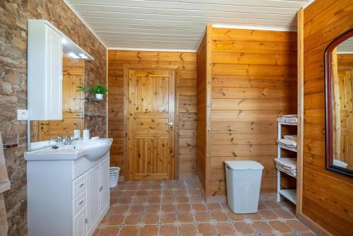 a bathroom with a sink and a toilet at Rustic Villa Retreat in Pinoso