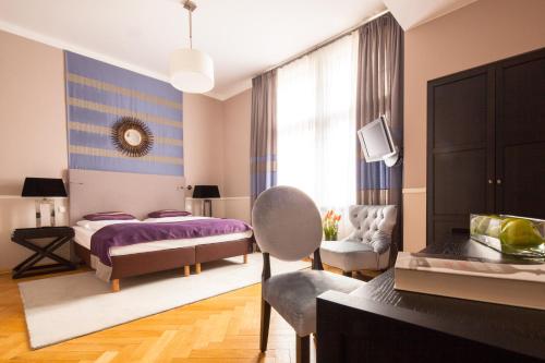 En eller flere senge i et værelse på Hotel Elba am Kurfürstendamm - Design Chambers