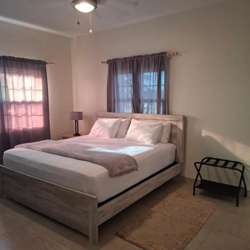 Postelja oz. postelje v sobi nastanitve Sea View Escape