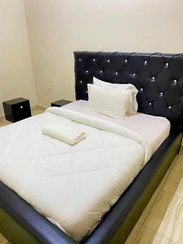 Llit o llits en una habitació de LUMA stay B&B