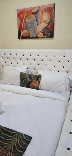 Llit o llits en una habitació de LUMA stay B&B