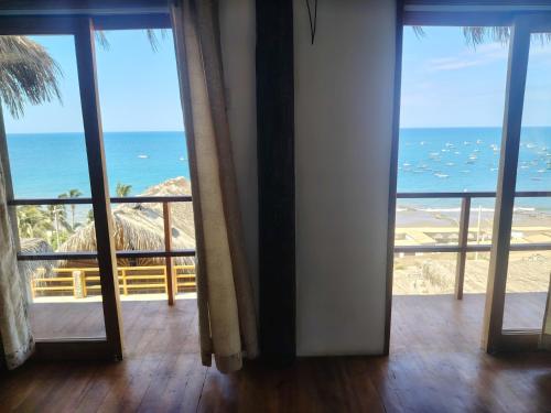an open room with a view of the ocean at Departamento 1 dormitorio in Máncora