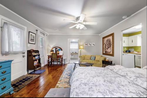 a bedroom with a bed and a ceiling fan at Peaceful Private Cottage, Walk to Park & 5 Mins to Downtown in Nashville