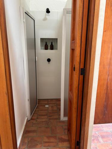 a hallway with a door leading into a room at Casona El Nacional in San Gil