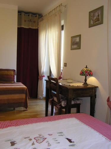 Postel nebo postele na pokoji v ubytování B&B Au Petit Bonheur
