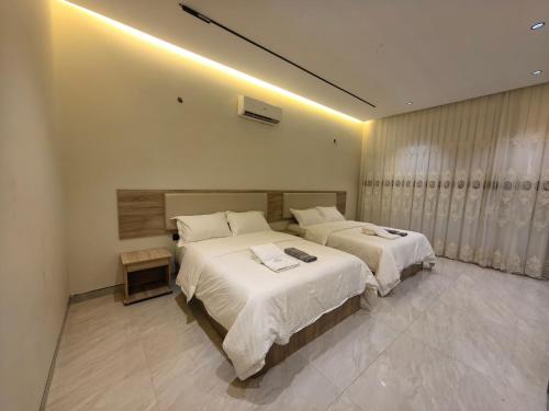 Katil atau katil-katil dalam bilik di China Hotel