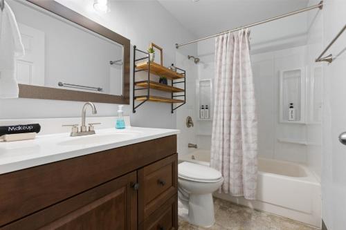 a bathroom with a sink and a toilet at Siesta Sunset in Boise