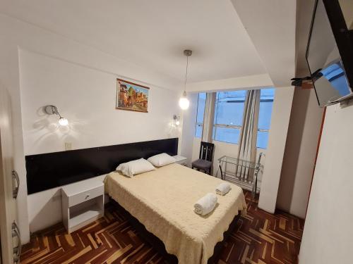 Llit o llits en una habitació de Kallpa