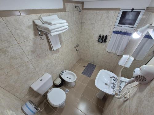 an overhead view of a bathroom with a toilet and sink at Departamentos Blazu Cafayate in Cafayate