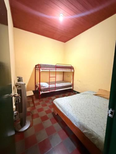 Llit o llits en una habitació de SAM TRAVEL LEON