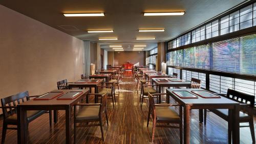 a row of tables and chairs in a restaurant at 筑波山江戸屋 in Tsukuba