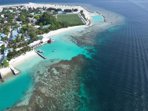 an aerial view of a beach in the ocean at Lagoon View Maldives in Bodufolhudhoo