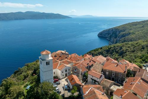 an aerial view of a town next to a body of water at Casa Nadia by Briskva in Mošćenička Draga