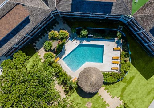 an overhead view of a swimming pool in a yard at Grand Hotel Excelsior Port Royal in Kingston