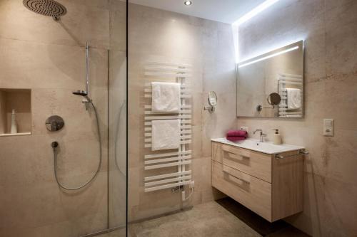 a bathroom with a shower and a sink at Appart Christophorus in Söll