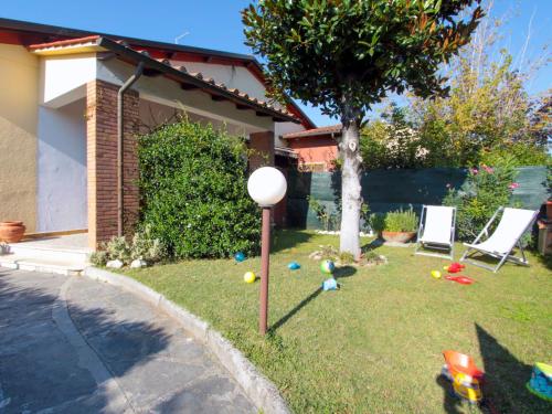 a yard with a ball yard with a street light at Villa Patrizia by Interhome in Forte dei Marmi