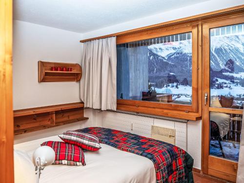 Apartment Chesa La Drosa AB by Interhome