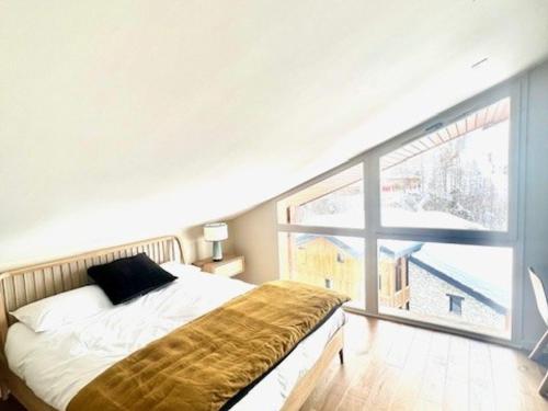 Duplex charmant 3 pièces, La Legettaz Val d'Isère, au pied des pistes, parking couvert.