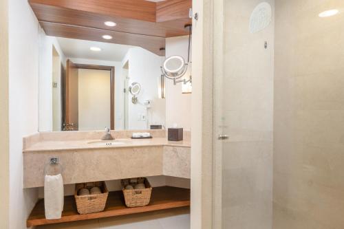 a bathroom with a sink and a mirror at Royal Solaris Los Cabos - All Inclusive in San José del Cabo