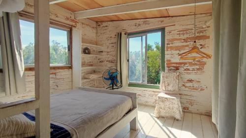 Postel nebo postele na pokoji v ubytování Casa Iris