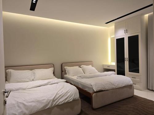 Llit o llits en una habitació de Sea Wind Chalet