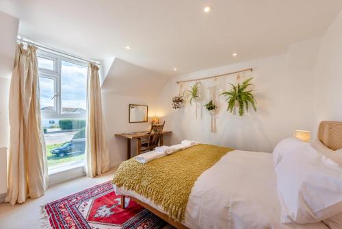 a bedroom with a bed and a large window at 2 Bed in Shoreham-by-Sea oc-b29920 in Shoreham-by-Sea