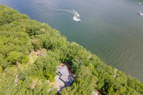 an aerial view of a lake with a boat in the water at Blue Stone Lodge by Railey Vacations in Swanton