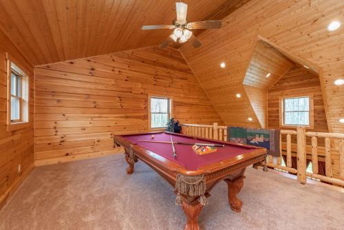 a pool table in a room with a ceiling at Bucks Run by Railey Vacations in Oakland