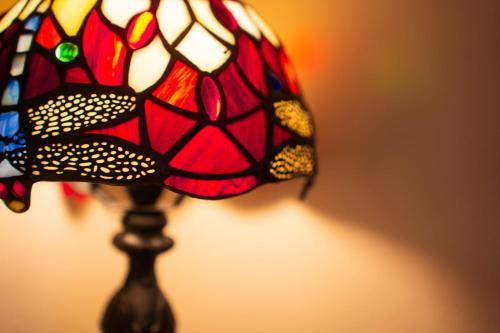 a close up of a stained glass lamp at The George Inn in Tideswell