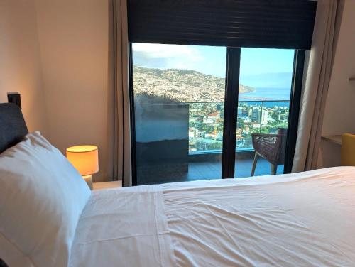 Sky-High Elegance Top-Floor Views of City, Ocean & Sunrise