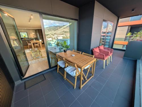 Sky-High Elegance Top-Floor Views of City, Ocean & Sunrise