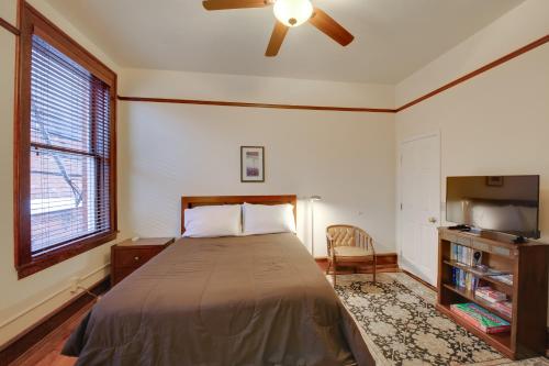 a bedroom with a bed and a ceiling fan at Epic Silver Valley Basecamp: Steps to Dtwn Fun! in Wallace