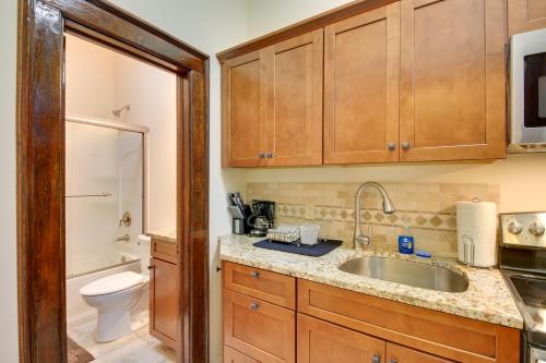 a small kitchen with a sink and a toilet at Epic Silver Valley Basecamp: Steps to Dtwn Fun! in Wallace
