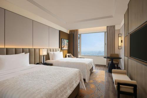 Llit o llits en una habitació de Orange Megastructure