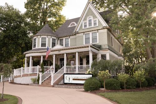 a house with a flag on the front porch at The Ginkgo Tree in Mount Pleasant