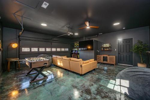 a living room with a couch and a table at Casa Olive by Railey Vacations in Accident