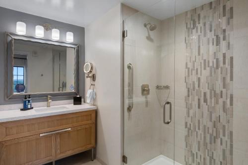 a bathroom with a shower and a sink at Club Wyndham La Cascada in San Antonio