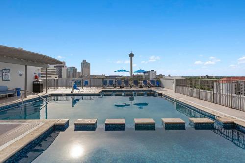 a swimming pool on top of a building at Club Wyndham La Cascada in San Antonio