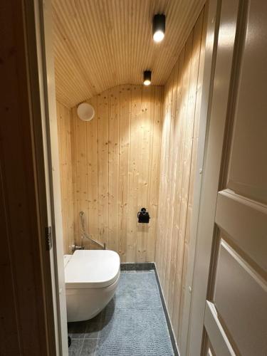 a bathroom with a toilet and a sink at Northern lights Ivalo Stay in Ivalo
