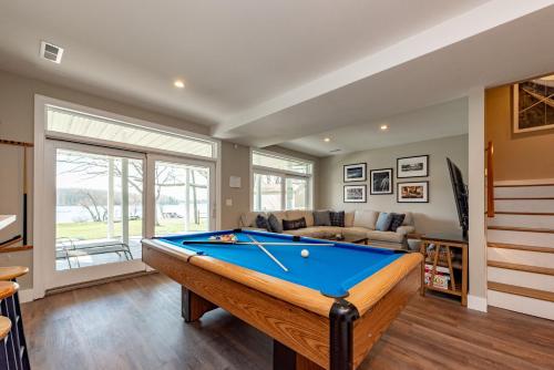 a living room with a pool table in it at Starry Night by Railey Vacations in Swanton