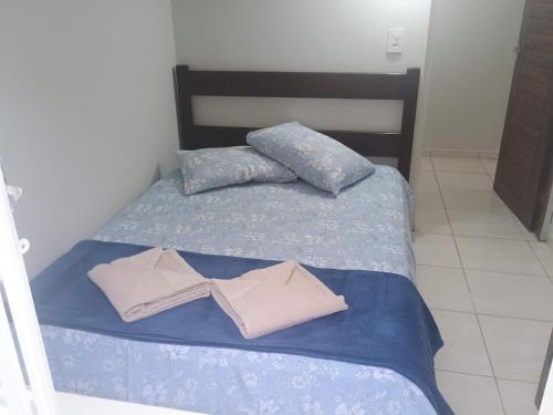 Llit o llits en una habitació de Microcasa pratica
