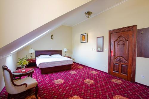 Posteľ alebo postele v izbe v ubytovaní Hotel Róża
