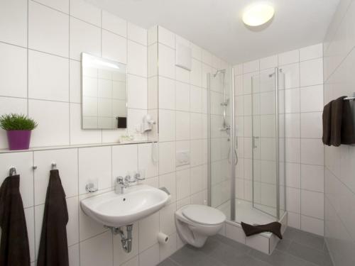 Kylpyhuone majoituspaikassa Hotel Sielminger Hof