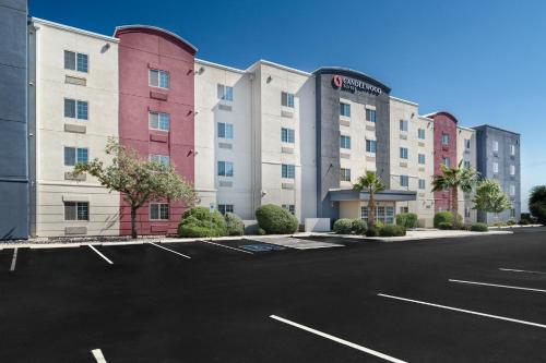 an empty parking lot in front of a hotel at Candlewood Suites El Paso by IHG in Sunrise Acres