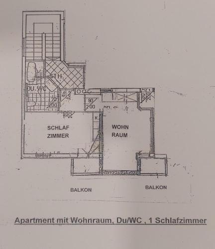 a black and white floor plan of a building at Haus Holzer in Dorfgastein